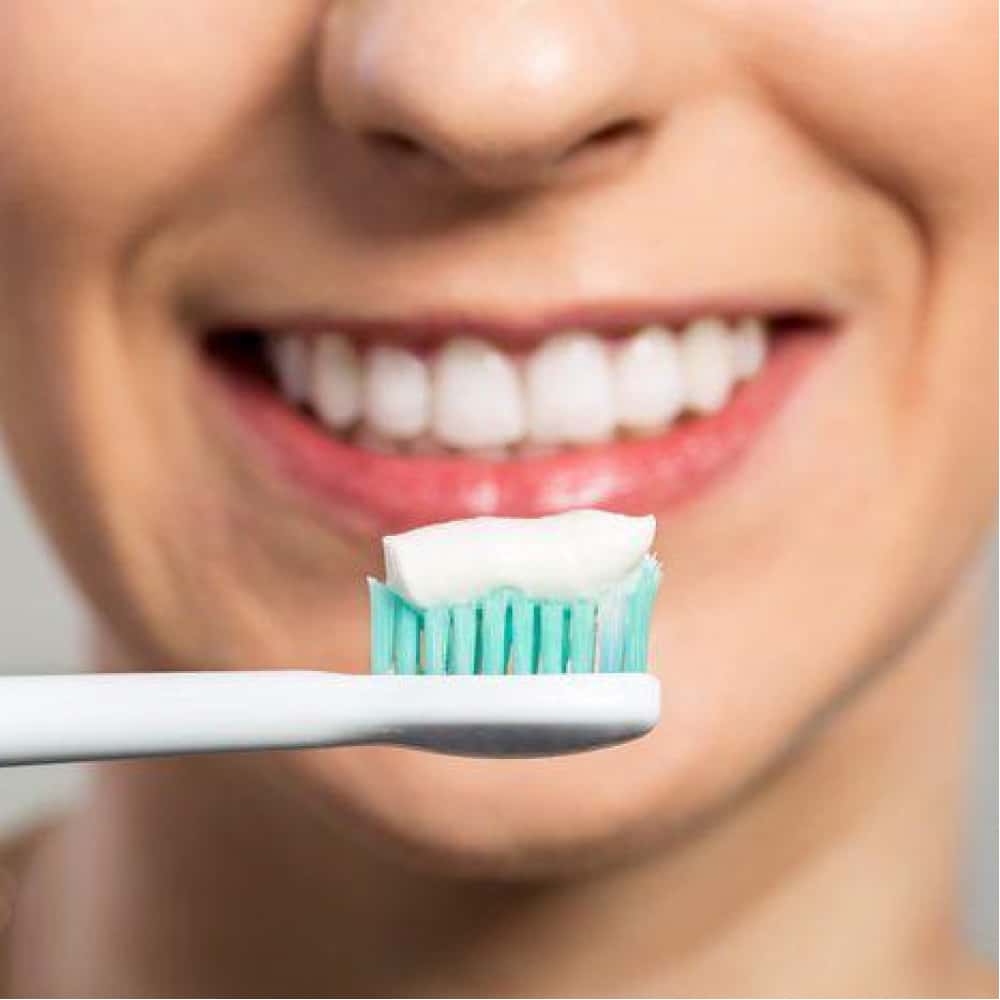 Pasta dental con protección de caries Colgate (70 g / 2.5 oz) - Miniatura 5