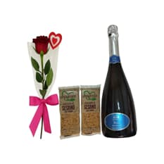 Una rosa con dos turrones de mani y una botella de vino espumoso italiano. Ola Flowers